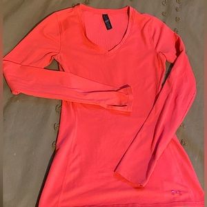 Under armor fitted running or exercise shirt.